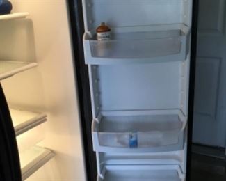 Whirlpool side by side refrigerator freezer- Garage