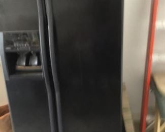 Whirlpool side by side refrigerator freezer- Garage
