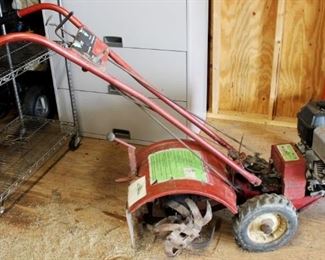 71 - Briggs & Stratton Gas Powered Tiller 48.5 x 62 x 19.5