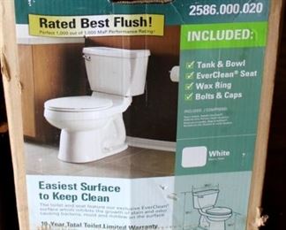 76 - American Standard Toilet- new in box 32 x 12 x 16.5