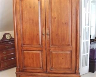 781 - Bassett Wardrobe Entertainment Stand Contents not included 48" x 80" x 26"