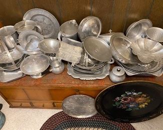 Tons of hammered aluminum pieces