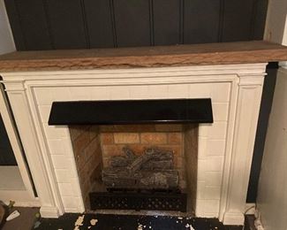 Gas logs, grate, stone mantle