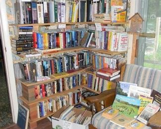 very large amount of RELIGIOUS and current novels  there are 4 corners like this ( in the chair are some of the local books