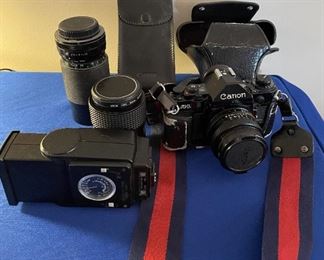 Canon A-1 film camera with lenses