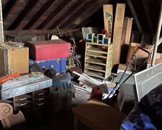 Enter the attic! Very cool looking (maybe vintage ikea) shelf in the distance