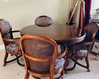Dining Table with 4 Rolling Chairs.