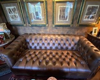 Leather sofa with nailhead trim.  