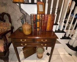Two drawer accent table with accessories