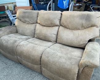 Beige three-seat recliner sofa