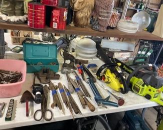 Chain saws, assorted tools.