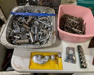 All sizes of sockets and drill bits.