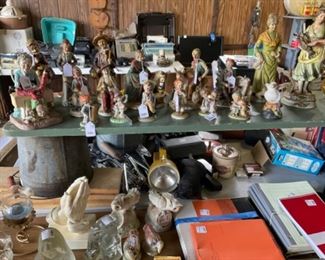 Many figurines, office supplies.