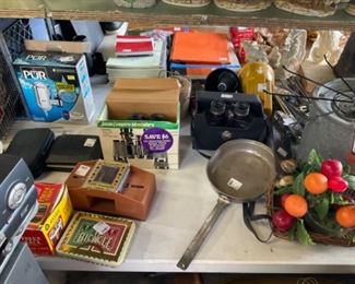 Minnow bucket, binoculars, card shuffler.