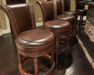 Brown leather swivel stools from Frontgate,  6 available,  45"H, 30" seat height, $225 each