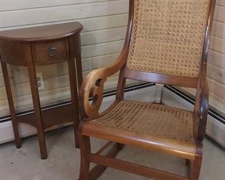 Cane Upholstered Rocking Chair and Leick Home Side Table
