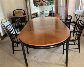 Michael Taylor for New World Baker Furniture. Cherry top/ebony edge and legs/brass trim. 3 leaves. Opens to 96” fully extended. 54” L with no leaves. Width 46”. Protective pads. 2 self storing fold down legs for full extension. $1,500