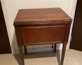 1 antique sewing machine with cabinet and extension leaf. Round robin Model MLB New Home Electric Westinghouse with knee switch, manual and attachments.  Starts but may need work. Make offer.