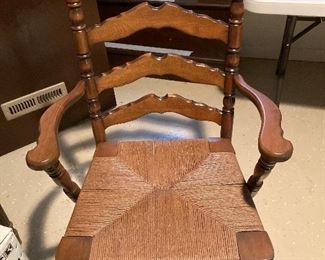 1 antique ladder back chair with cord seat. Very good condition. 39” high. Width 22.5”. Depth 18” Beautiful craftsmanship. $300