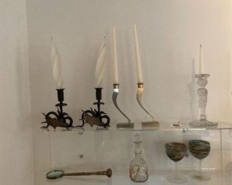 Assorted decorative glass and metal. Art Deco griffin candle sticks, MCM silver candlesticks