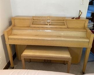 Chickering & Sons MCM 1950 - 1955 spinet style blond wood piano and bench with storage. Serial #203553 60” L X 24” D X 39” H. $300 needs tuning.