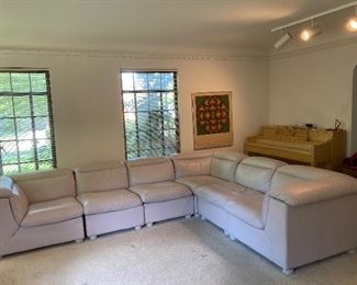 Natuzzi Italia six piece leather sectional light grey. Made in Italy. L shape 129” long side. 103” short side. Seat depth 22”. Total depth 40” Height 29”. $1,200