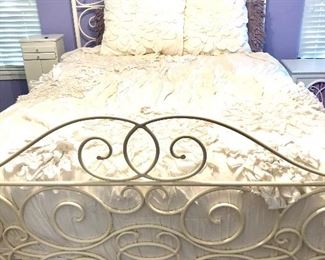 Romantic scroll white iron queen bed. Comes with canopy rails