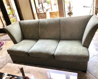 Distinctive flare arm sofa by Donghia