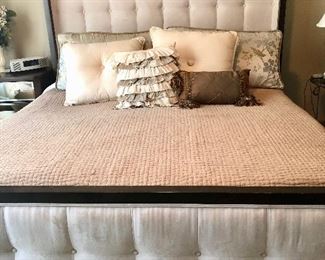 Sensational king bed from Pilie'. Tall tufted headboard and matching footboard are ivory suede.