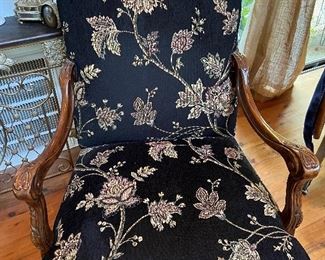 Pair fabric accent chairs with carved arms and legs