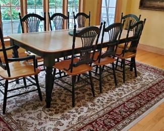 Quality kitchen set. Table with eight chairs including two sides. Deep green trim