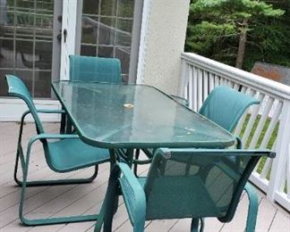 Two patio table/chair sets