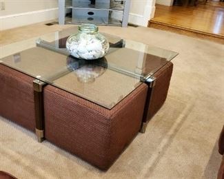 Great glass coffee table being sold with four tuck away cube seats