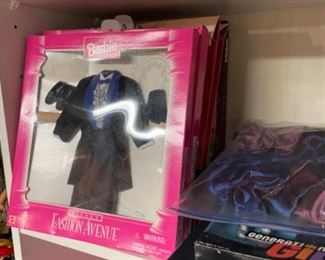 Tons of Barbie clothes and accessories