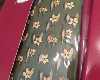 The colors and designs on these Ferragamo ties are amazing!  Several still in their original packaging!