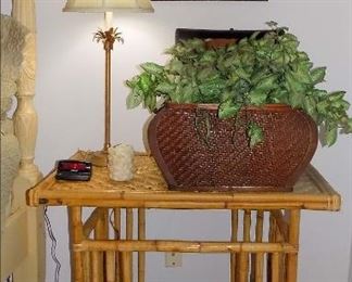 Vintage Bamboo Side Table. There is a pair palm tree lamps.  There are also lots of artificial plants.