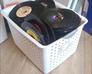 Over 200 45 rpm Records.  Looks like somebody raided a 1980s jukebox!
