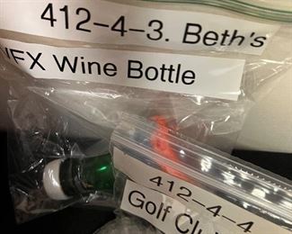 Beth’s wine bottle and Daryl’s golf club head both from season 4 episode 12