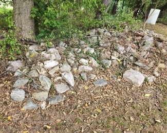stones, in yard near parking