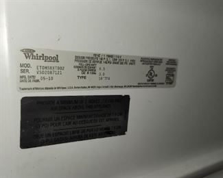 smaller black Whirlpool refrigerator
