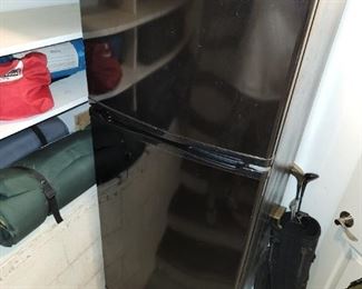 smaller black Whirlpool refrigerator