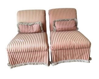 $200 - Pair of Striped Slipper Chairs ES99-14                         These beauties add a bit of glam to any room. Perfect for a bedroom, formal bathroom, sitting room or den. The striped upholstery ends with fringe trim with companion bolster pillows makings this set definite statement pieces.

Width : 26
Depth : 29
Height : 33

Condition Desc. : Good Condition. A few spots on fabric

LOCAL PICK UP MCLEAN, VA. SHIPPING SUGGESTIONS AVAILABLE UPON REQUEST.