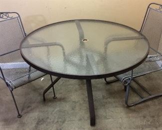 PATIO TABLE & 2 WROUGHT IRON PATIO CHAIRS