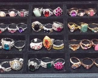 60 ASSORTED COSTUME JEWELRY RINGS, ASSORTED SIZES & ASSORTED COLORED STONES