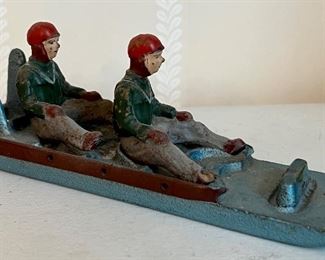 Antique Cast Iron Toy, Boys in Tobbogan