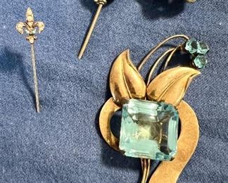 Antique 10K Fleur de Lis Stick Pin (far left)                                             Gold Filled Hat Pin (middle)                                                                       Antique Gold Filled Pin with Opal (upper right)                                   Sterling Silver & Stone Pin (front)