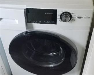 GE washing machine - Euro size. Model GFW148SSMOWW 24" front loader. Nearly new.