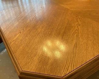Dining room table and extensions have perfectly matched woodgrain detailing