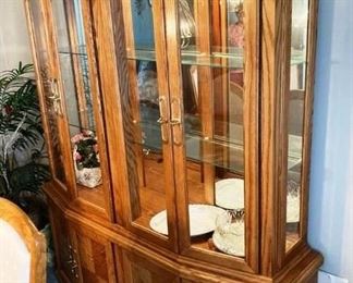 Bow front, lighted hutch