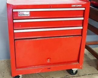 Craftsman Tool Chest With 3 Drawers And Lower Storage, Some Contents Include Hammers, Hack Saw, Piers, And Sockets